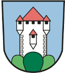 Blasonierung: In Blau über grünem Dreiberg ein gemauerter silberner Turm mit drei Erkern und rotem Dach 